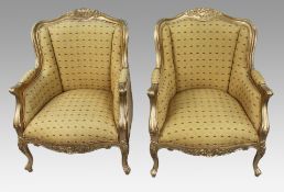 Pair of Louis XVI Style Carved Gilt Bergère Armchairs