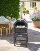 (19/P) RRP £200. La Hacienda MultiFunctional Pizza Oven Black. Can Cook Artisan Style Pizza, Tast...