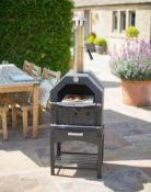 (18/P) RRP £200. La Hacienda MultiFunctional Pizza Oven Black. Can Cook Artisan Style Pizza, Tast...