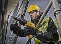 (196/Mez) RRP £120. DeWalt 22mm 710W Corded SDS Plus Hammer Drill D25033K-GB With Kit Case.