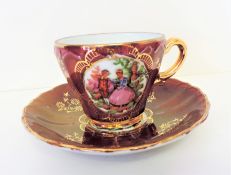 Vienna Style Porcelain Decorated & Gilded Cup and Saucer