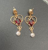 Heart shape earrings.