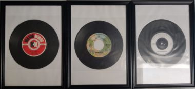 A collection of 3 x Framed vinyl records. (refP).