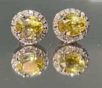 Beautiful Natural Unheated Yellow sapphire earrings with diamonds and 18k gold