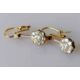 A pair of white and yellow metal diamond earrings, the central round-cut diamond approximately 0.20 - Image 2 of 6