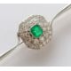 An Art Deco emerald and diamond platinum brooch, the emerald 5mm x 6mm, thirty-one round-cut diamond - Image 1 of 5