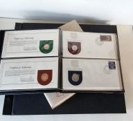 A 1975 Papua New Guinea Official First Day Issue Coin Cachet (of eight) in album and an album of Bri