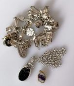 A David Scott-Walker 9ct yellow gold oval hard stone pendant 17mm, 5.63g; another by DSW in silver,