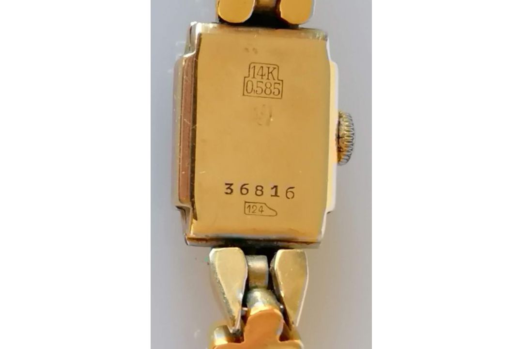A vintage ladies gold dress watch with black face and Arabic numerals, Swiss mechanism on an 18ct go - Image 2 of 3
