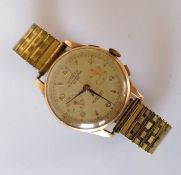 A vintage Swiss Binesa chronograph watch, dial with overlaid markers and Arabic numerals, red and bl