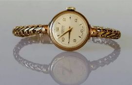 A vintage ladies dress watch with 9ct gold case and woven bracelet strap, hallmarked, 20g