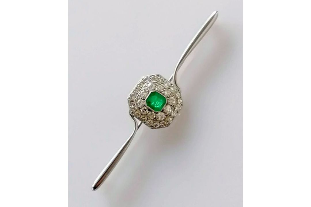 An Art Deco emerald and diamond platinum brooch, the emerald 5mm x 6mm, thirty-one round-cut diamond - Image 3 of 5