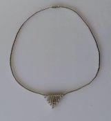 A white gold articulated necklace with integrated pendant with diamond decoration, total diamond app