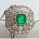 An Art Deco emerald and diamond platinum brooch, the emerald 5mm x 6mm, thirty-one round-cut diamond - Image 4 of 5
