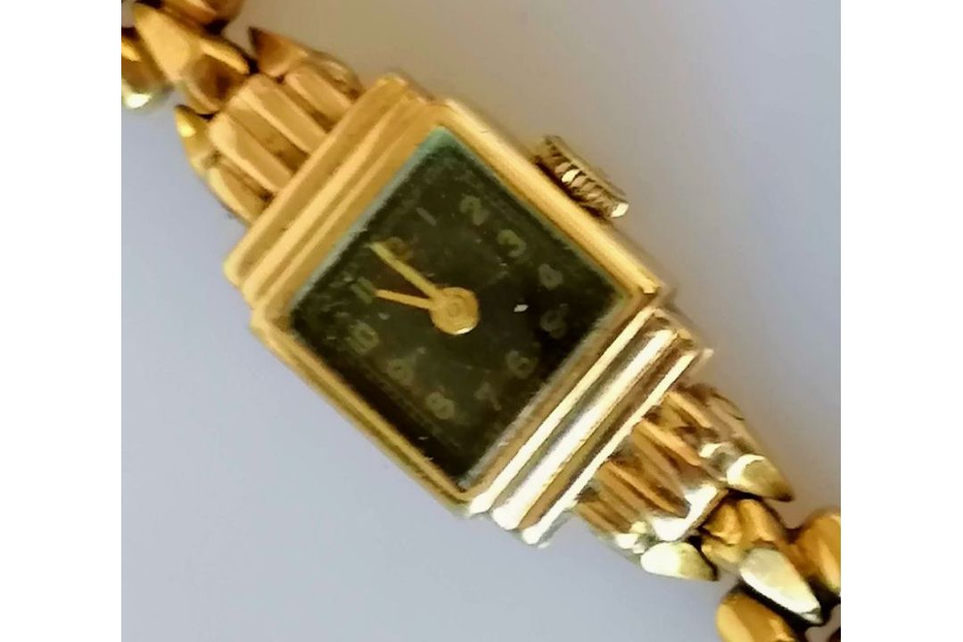 A vintage ladies gold dress watch with black face and Arabic numerals, Swiss mechanism on an 18ct go - Image 3 of 3