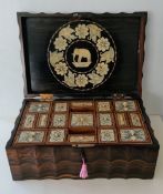 A 19th century Anglo-Indian coromandel or zebra wood work box of oblong form with elaborately fitted
