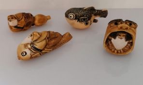 A Meiji period ivory netsuke of a bearded man on a fish, unsigned, 6 cm W; another of a bearded man,