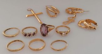 An assortment of seven 9ct yellow gold rings, some gem-set, three pairs of earrings and two pendant,