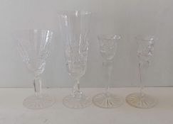 A set of eight Waterford Crystal wine or water glasses, 16 cm H and six champagne flutes, 20.5 cm H