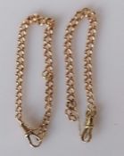 Two rose gold flat curb-link bracelets made from an Albert chain,