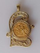 A QE2 gold half sovereign, 1982, set in an elaborate mount, hallmarked 9ct, 9.2g