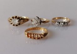 A 9ct yellow gold solitaire signet ring, claw set with a brilliant-cut white stone, 0.50 carats;