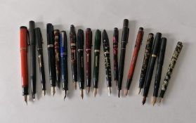 An assortment of eighteen vintage fountain pens to include Waterman's, Parker, Stephens, Swan, etc (