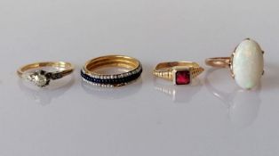 A diamond solitaire in a gold and platinum claw setting, stamped 18ct PLAT,
