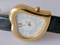 An Yves Saint Laurent heart-shape quartz ladies watch with original strap
