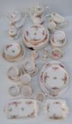 A seventy piece Royal Albert 'Moss Rose' tea and part dinner service