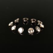 10 Diamanten im Brillantschliff, zusammen um ca. 2ct., in Dose