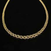Kette, 585/14K Gelbgold (punziert), 16,3g, aus verschiedenen Ringelementen gefertigt und zur Mitte 