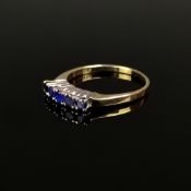 Saphir-Goldring, 585/14K Gelbgold (punziert), Ringkopf besetzt mit 5 rund facettierten, natürlichen