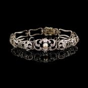 Perlen-Diamant-Armband, 585/14K Weißgold (punziert), 13,85g, schauseitig vegetabiles, durchbrochen 
