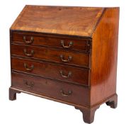 A George III mahogany and rosewood banded bureau,