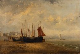 Dutch School (late 19th century) Low tide, fishing boats along a harbour wall,