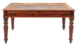 A Victorian mahogany library table writing table,