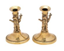 Other Properties A pair of brass candlesticks,