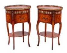 A pair of tulipwood marquetry, gilt metal and porcelain mounted petite commodes in Louis XV taste,
