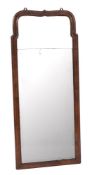 A Queen Anne walnut framed pier mirror, early 18th century; of rectangular form,