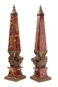 A pair of late 20th century ceramic and metal mounted obelisks in the Indian style,