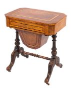 A Victorian walnut sewing table, circa 1870; the satinwood banded top with canted corners,
