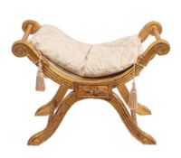 A Continental carved and giltwood 'X' frame stool in Louis XVI taste,