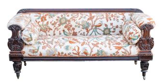 A William IV carved mahogany and upholstered sofa,