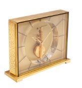 Jaeger-LeCoultre a gilt-brass and lucite Baguette desk clock,