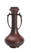 A Chinese bronze two handled vase of ovoid form with slender neck,
