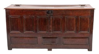 A substantial oak coffer,