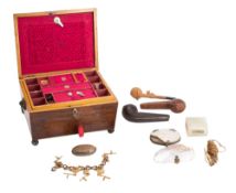 A 19th century rosewood and boxwood strung sewing box with lift out tray, raised on peg feet,