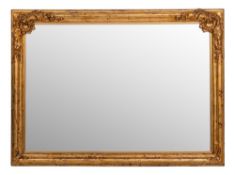 A gilt composition framed rectangular wall mirror in 18th century taste,