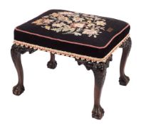 A mahogany and upholstered stool in George III style,